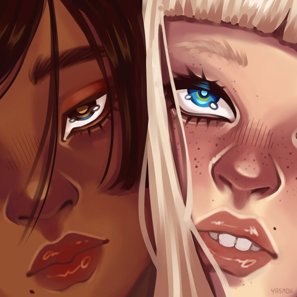 imagem de um super close de duas mulheres, uma com a pele escura e cabelos castanhos e uma com a pele clara e loira.